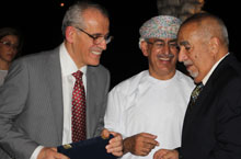 Dr. Abdul Rahman Al Awadi from Kuwait, while receiving the award from HE Dr Ahmed Bin Mohamed Al- Saidi and Dr Ala Alwan