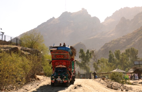 1._A_truck_arrives_at_the_Torkham_border_in_Nangarhar_eastern_Afghanistan_after_crossing_the_border_from_Pakistan