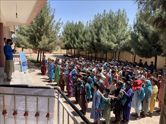 7_Masoud-Faizi_a_community_mobilizer_provides_information_about_CCHF_at_a_publi_school_in_Injil_district_of_Herat