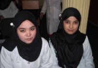 Freshtah (right)  and Khadija both graduated with a 100% score from the final examination