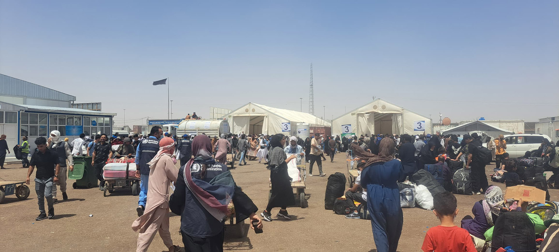 WHO on the ground at Islam Qala on 7 July 2025,  providing critical health support to vulnerable returnees and families in need. Photo credit: WHO/Dr Rahimi, WHE Focal Point