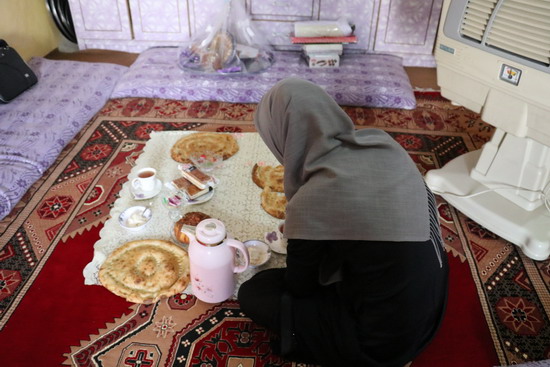 Dr Farima prepares to head out for the day to educate communities on polio and COVID-19. ©WHO/Afghanistan 