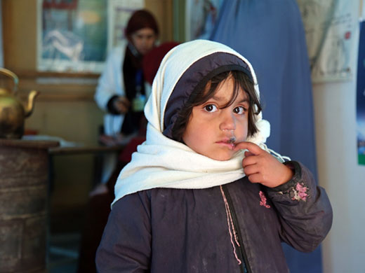 Credit: WHO Afghanistan/S.Ramo Five-year-old Farzana’s mother brought her to the clinic for a health check-up at the Nasaji Bagrami IDP camp. Farzana’s family was forced to return from Pakistan 6 months ago after having lived there for 20 years. Most common and serious problems for children living in the camps are respiratory infections and pneumonia in the winter, and acute watery diarrhoea in the hot summer months.