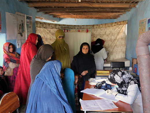 Credit: WHO Afghanistan/S.Ramo The mobile clinics are often busy with people queueing for check-ups, vaccines and prescription medicines. Over 40 000 people living in the camps rely on the WHO-supported mobile clinics for basic health services. “We get good quality medicines and health services here for free and cannot afford to go outside for treatment. This clinic is very important for all of us here,” said Khairunesa, one of the residents at the Pul-e-Company camp, pictured in the middle wearing a black headscarf. She fled the conflict in Kunduz and has lived in the camp for 7 months.