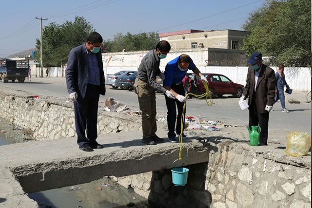 Credit: WHO Afghanistan/S.Ramo 3) Expanding environmental surveillance Afghanistan continues to step up environmental surveillance: currently 20 environmental sampling sites are operational in nine provinces. Four new environmental sampling sites have been established in 2017 and sampling frequency has been doubled in high-risk areas in the south. Environmental surveillance, the collection of sewage samples and testing them for poliovirus in the laboratory, ensures that all strains of wild or circulating vaccine-derived poliovirus in the sewage system are detected, helping to determine possible routes of transmission and enabling a swift response to stop further spread of the virus. In 2017, from the 218 sewage samples collected from all sites, eight have tested positive for wild poliovirus.