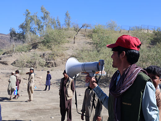 Photo credit: WHO Afghanistan/S.RamoVaccinator Jawad calls out for children under the age of 10 at the Torkham border to get a polio vaccination if they have not yet received it from teams climbing into trucks. Currently polio teams are working at 17 cross-border points to ensure that all children entering Afghanistan get immunized against polio. Over 280 permanent transit teams vaccinate children who travel in and out of security-compromised areas and children traveling to other destinations to ensure that every child on the move receives 2 drops of the oral polio vaccine to grow up healthy. With transmission limited to small geographic areas this year, Afghanistan is close to stopping the circulation of wild poliovirus. To eradicate the debilitating disease for good, vaccination teams must continue to reach every single child, everywhere. Photo credits: WHO Afghanistan/S.Ramo  