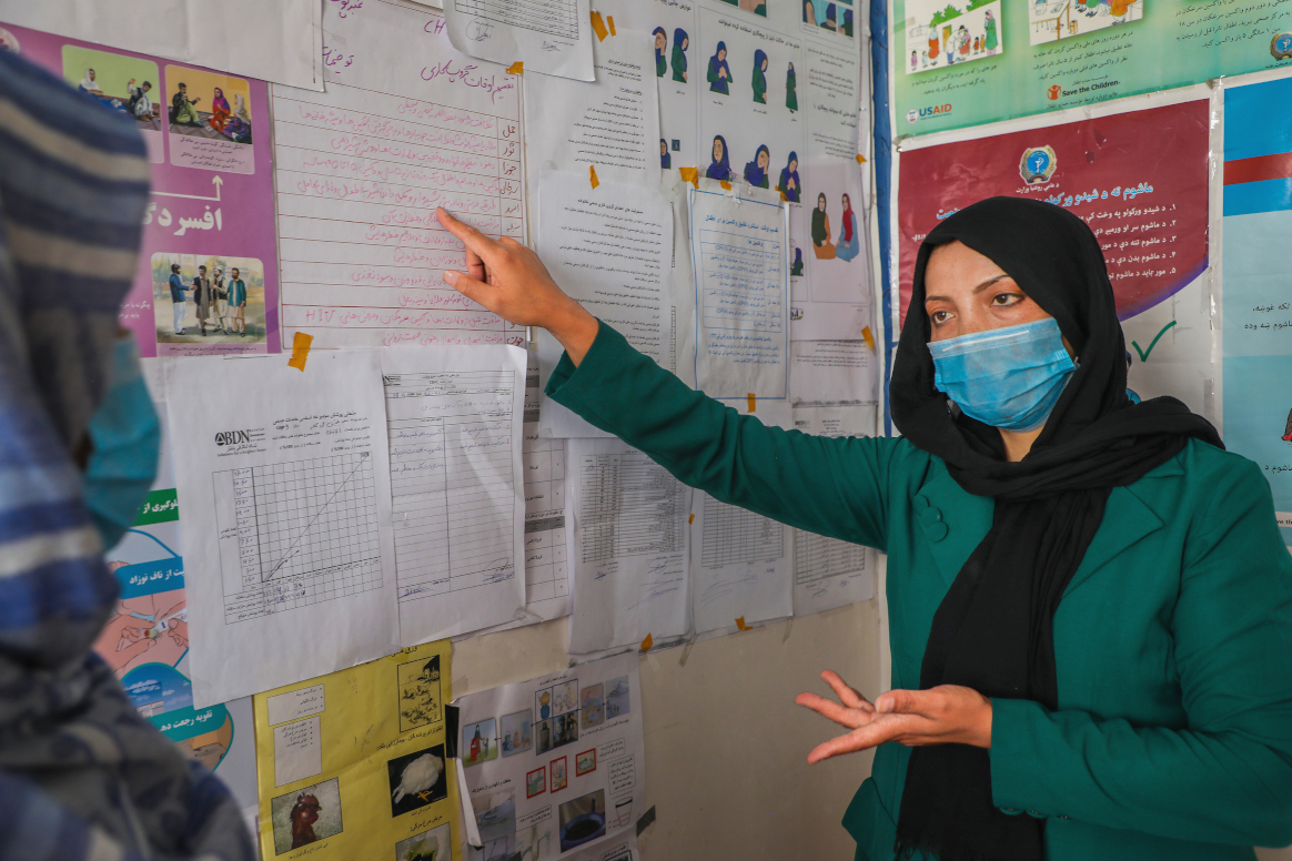 Nasrin takes a leading role sharing health information with local women through her role as a District Polio Officer and midwife. Alongside thousands of her colleagues, she has devoted the last seven months to mitigating the effects of COVID-19. ©WHO Afghanistan/Roya Haidari