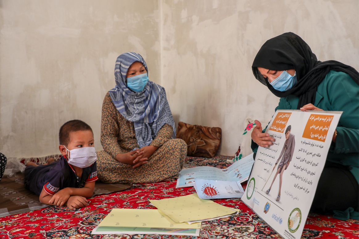 Besides her work on COVID-19 response, Nasrin teaches women in her community about symptoms of polio and how it can be prevented. ©WHO Afghanistan/Roya Haidari