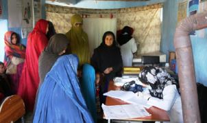 WHO supports health services in a Kabul Pul-e-Company IDP camp through a mobile clinic