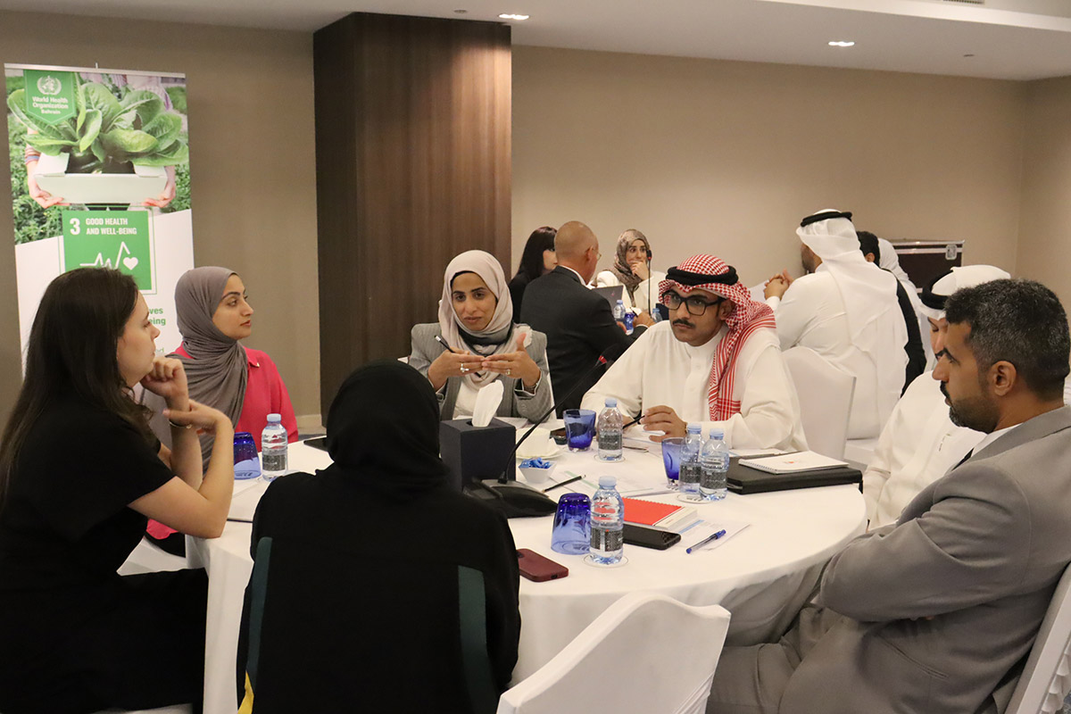 Participants at the consensus building workshop engage in group work activities. Photo credit: WHO/WHO Bahrain