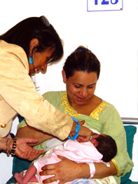 An infant while being breastfed