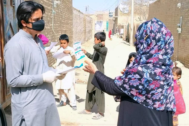 In Pakistan, community mobilizers tell communities how to protect themselves from the virus.