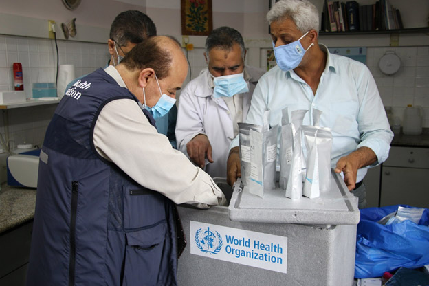 In Lebanon, WHO Representative Dr Iman Shankiti met with a fashion designer (right) to discuss options for making coveralls, gowns, and other protective gear for health workers.