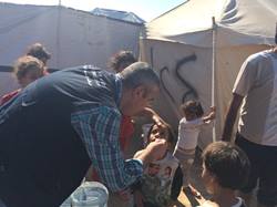 A_boy_receives_oral_cholera_vaccine_in_Baghdad