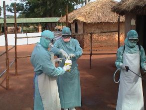 Laboratory staff collecting samples during a viral haemorrhagic fever outbreak