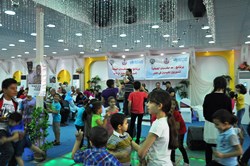 Syrian children enjoy an advocacy event organized in Egypt by WHO and the Ministry of Health and Population of Egypt
