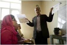 Old man participating in an educational class