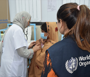 A mother and a child in a WHO-supported nutrition stabilization centre where mothers receive counselling on breastfeeding