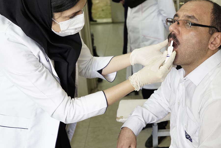 health-worker-performs_-HIV_testing-procedure-at-health-care-centre-Photo-Mr_Akbar-Badrkhani