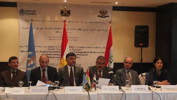 Speakers at the opening session of the workshop on the integrated district health system based on the family practice approach in Iraq, including the Minister of Health of Iraq and the WHO Representative