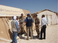 Humanitarian workers discussing logistical issues at Al Zaatari Camp