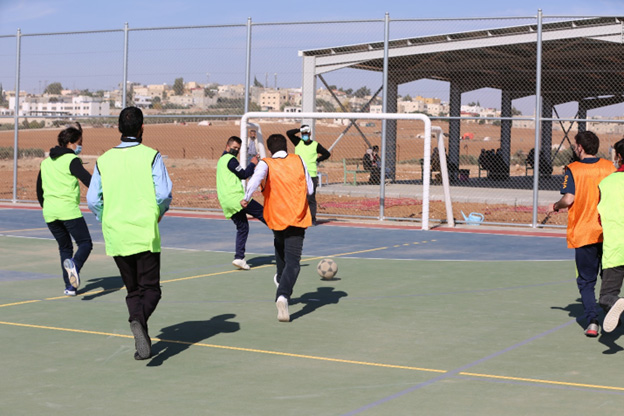 Children play football on the multipurpose playground constructed by WHO Jordan and partners for children of all abilities. Photo credit: WHO/ Abdelrahman Essa