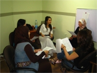 A group of women take part in capacity-building exercises 