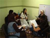 A group of women take part in capacity-building exercises A group of women take part in capacity-building exercises