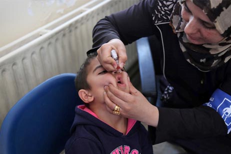 Children in a Ramtha health facility receiving OPV