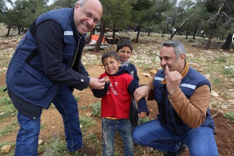 Children of a nomadic family in a high-risk area outside Jerash. Polio vaccinators reached the family’s under-5-year-old in the campaign. A mark on the boy’s ‘pinky’ finger, made with a semi-permanent marker, indicates that he was recently vaccinated