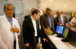 Minister of Public Health Wael Abu Faour demonstrates a heat scanner at the airport in Beirut