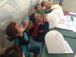 Children taking their polio vaccine