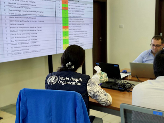 WHO and other health stakeholders discuss the trauma referral pathway at the public health emergency operations centre. Photo credit: WHO/S. Khare