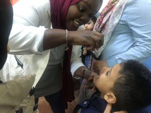 a child being vaccinated against polio