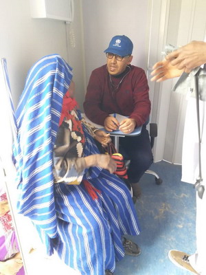 Woman_receives_medical_services_at_a_mobile_clinic