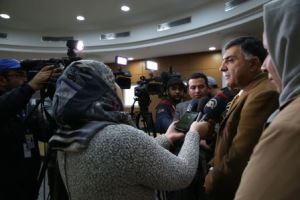 Dr Hussein being interviewed by the media