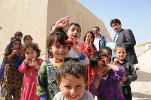 National Immunization Day, Afghanistan, children showing their fingers marked with indelible ink after they were vaccinated against polio.