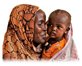 An African mother smiles at the child in her arms