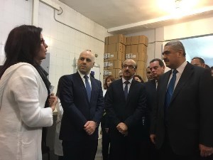 H.E. the Minister of Public Health of Lebanon Ghasan Hasbani, WHO Regional Director Dr Mahmoud Fikri and Director-General of the Ministry of Health Dr Walid Ammar visit a vaccine storage warehouse in Karantina