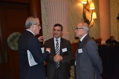 The Regional Director talking to two of the participants on the sidelines of the meeting