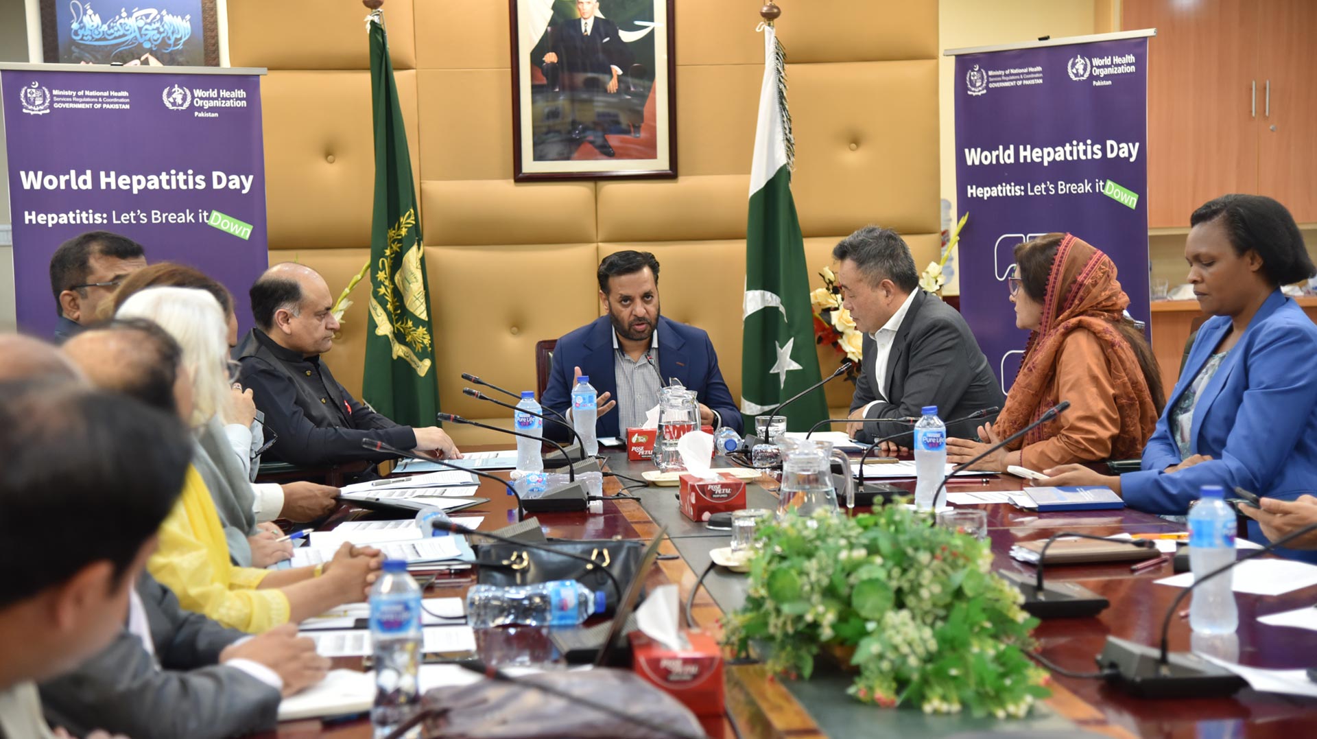 Federal Health Minister Syed Mustafa Kamal chairs the celebration of World Hepatitis Day, accompanied by WHO Representative in Pakistan Dr Dapeng Luo. Photo credit: WHO/Sara Akmal
