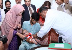 A child is vaccinated using inactivated polio vaccine (IPV) at the national launch of IPV in Routine Immunization in Islamabad, Pakistan, presided over by the Honorable Minister of State Mrs Saira Afzal Tarar