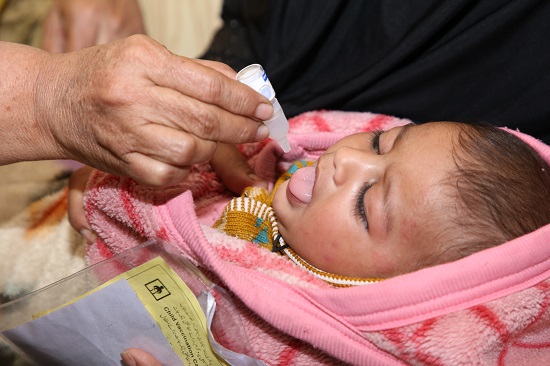 child-receives-polio-drops-at-expanded-programme-on-immunization-centre-in-lahore