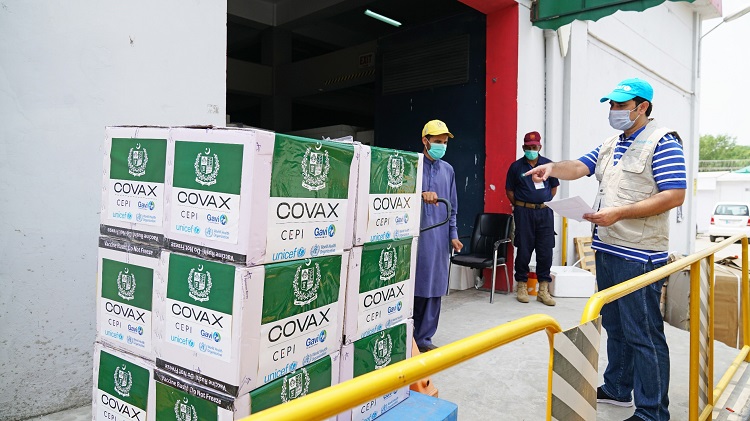 covax-vaccines-being-moved-into-warehouse