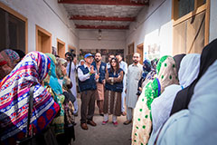 Volunteers are briefed before they go house to house