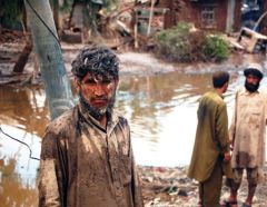 A group of men in Azakhel in Khyber Pakhtunkhwa working to reconstruct damaged property during the floods in Pakistan in 2010