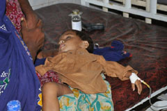 A child recuperates in a civil hospital in Sanghar, Sindh