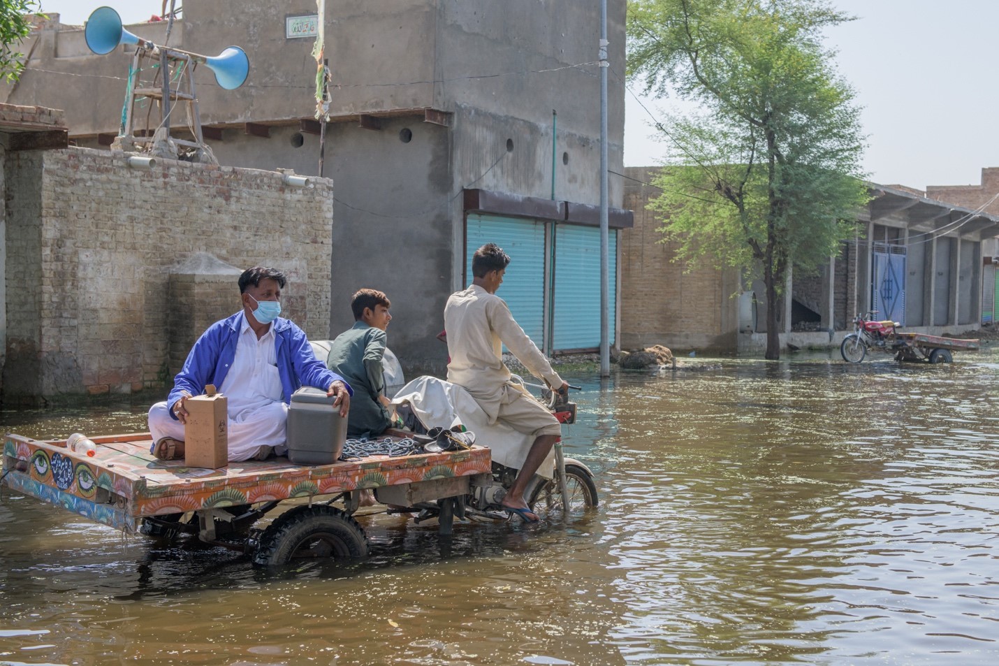 men-in-flooded-street
