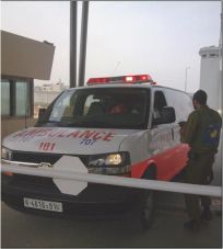 An ambulance held up at a checkpoint entering Hebron