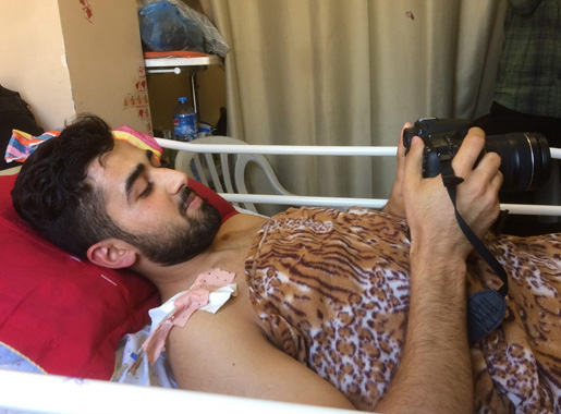 Journalist denied exit from Gaza for health care loses his left leg from a gunshot wound